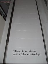 Cilinder in vozni ram skrita za dekorativno oblogo Cilinder in vozni ram skrita za dekorativno oblogo